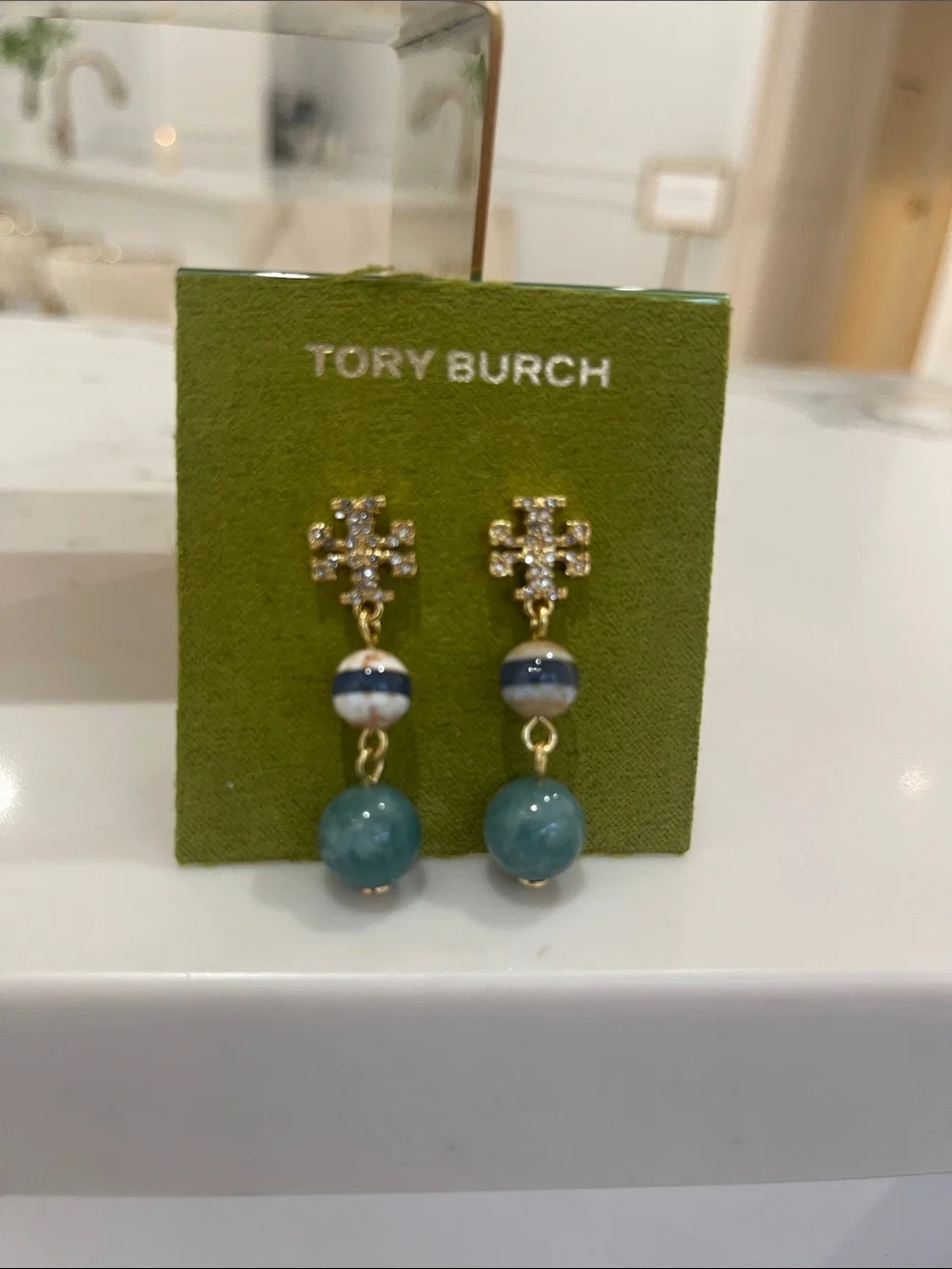 Tory Burch Gold Crystal Logo Drop Earrings with Teal and Navy Beads